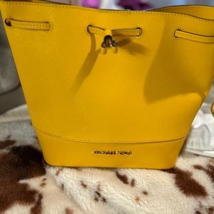 MK yellow bucket bag never used